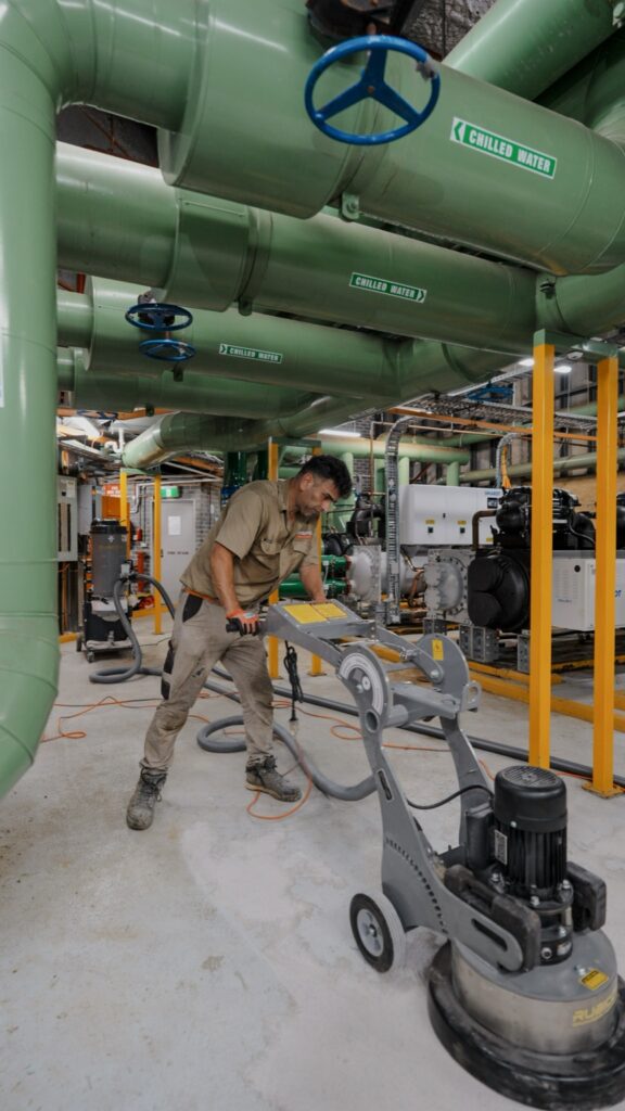 Grinding the floor in a commercial plant room